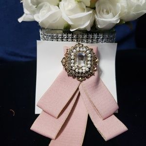 Pink brooch